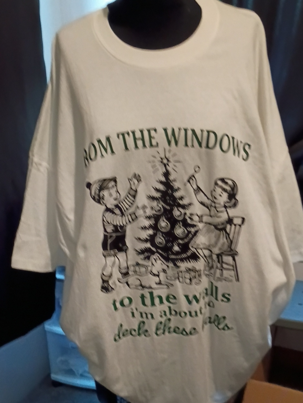 Vintage Style White Holiday Graphic Tee with Green and Black Print